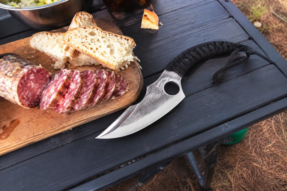 Predator knife on a camping table