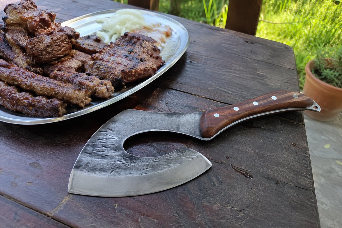 Chef axe next to a grill platter